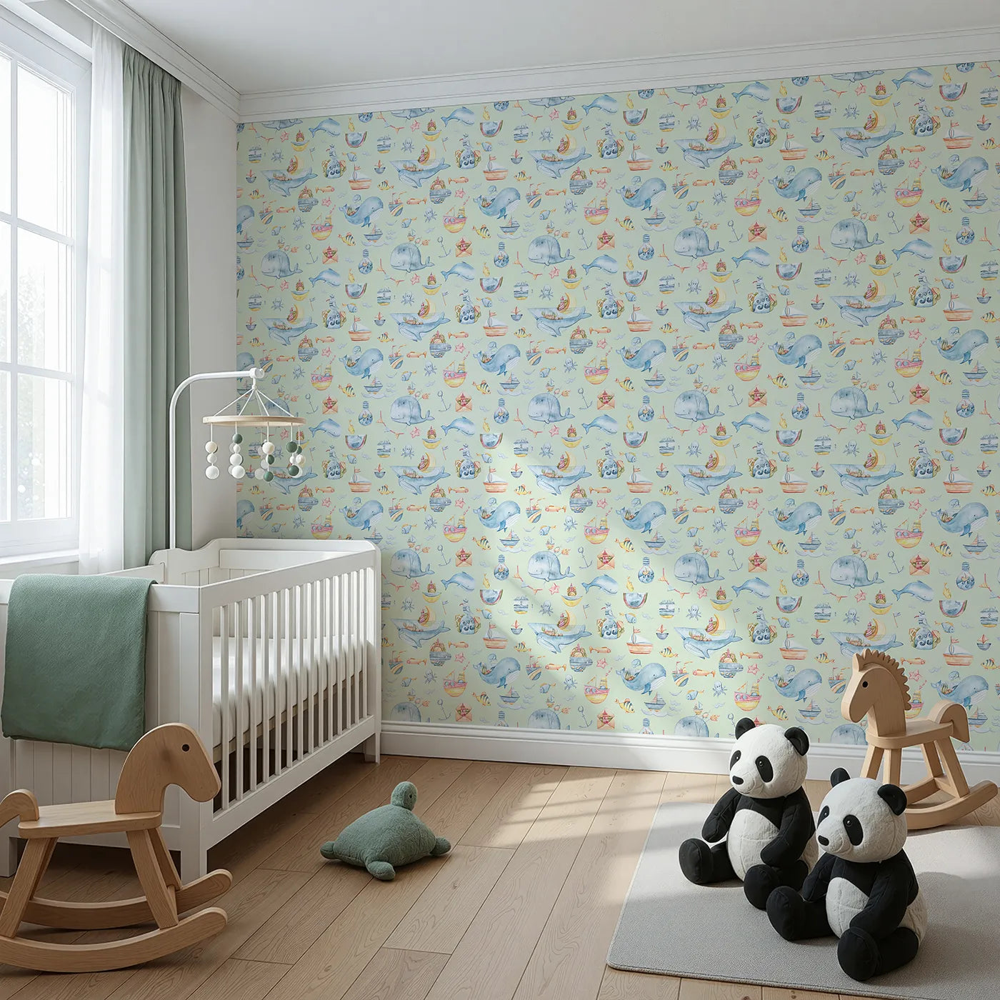Angled view of Whimsy Tots' Whale Mail Wallpaper in Mint Green (W3313D).Whales carry ocean treasures across fresh minty skies.