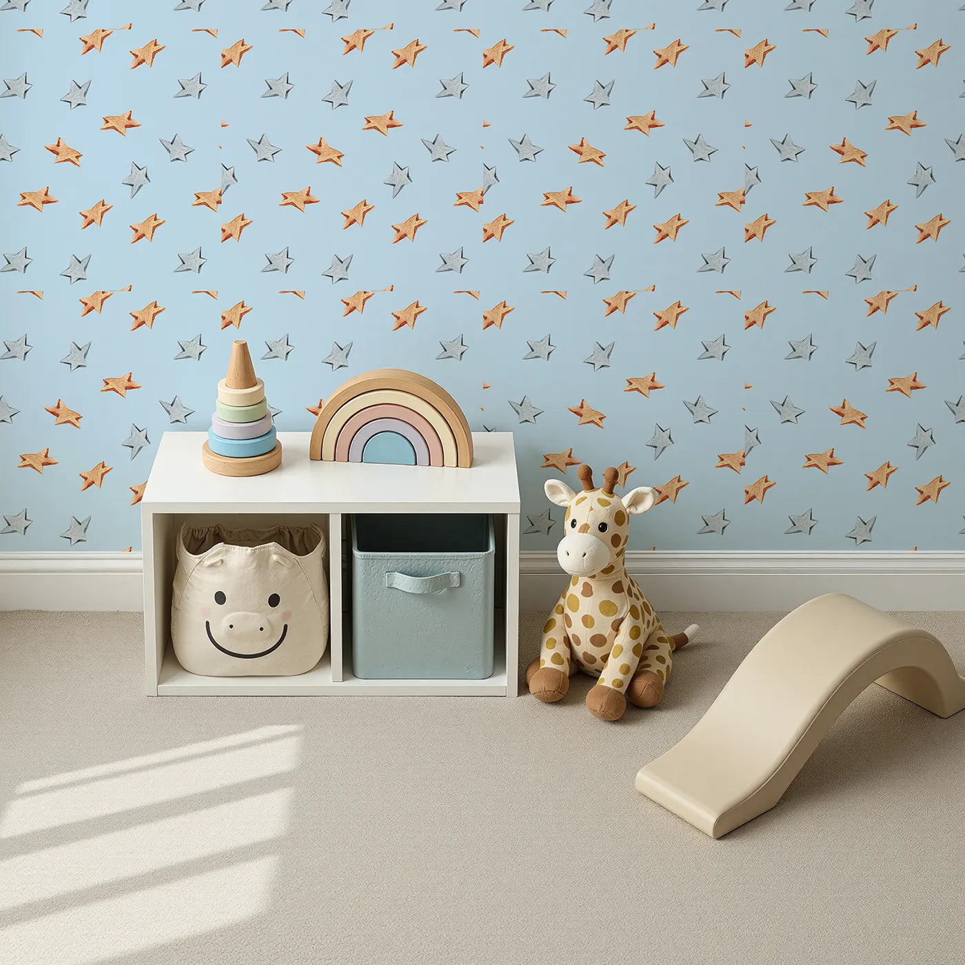 Top-Down view of Whimsy Tots' Wooden Star Sprinkle Wallpaper in Blue (W3315E).Orange and silver stars float peacefully across soft blue skies.