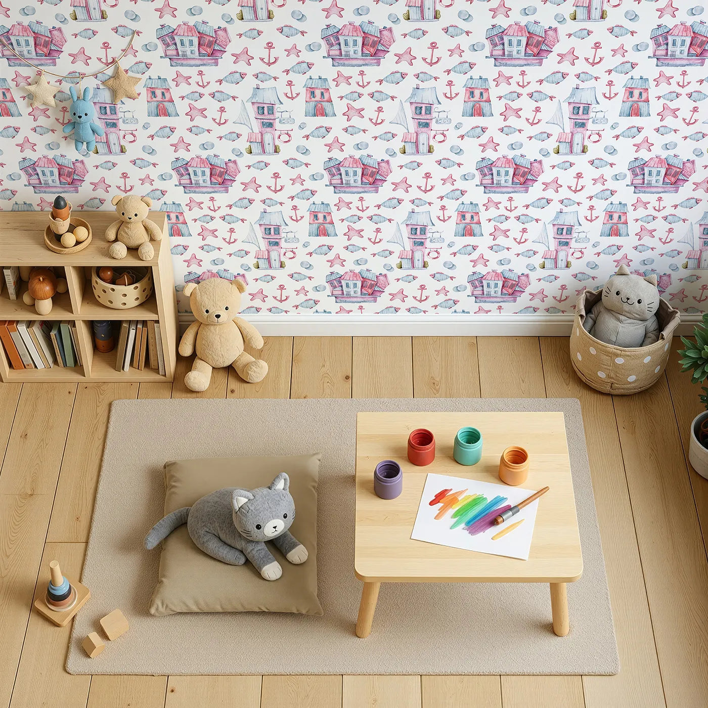 Top-Down view of Whimsy Tots' Seaside Village Parade Wallpaper in White (W3320A).Charming houses and cheerful fish dance through a playful seaside world.