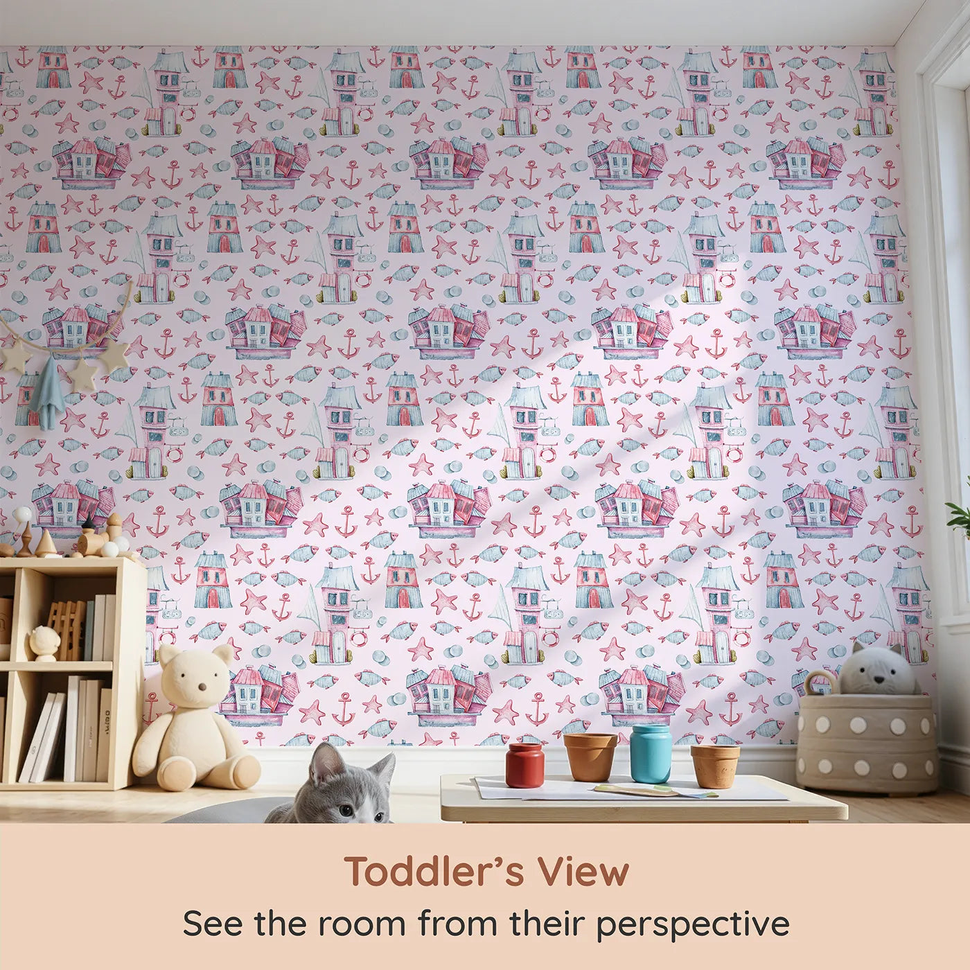 Whimsy Tots Seaside Village Parade Wallpaper in Pink (W3320B) from your child's view.Charming houses and cheerful sea creatures play across a pink seaside dream.