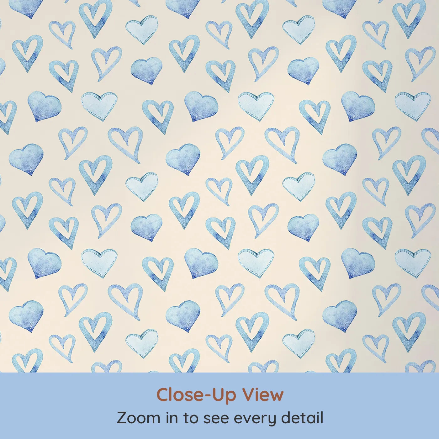 Close-up view of Whimsy Tots' Blue Hearts Wallpaper in Cream (W3330C).Soothing blue hearts dance softly across a creamy, cozy sky.