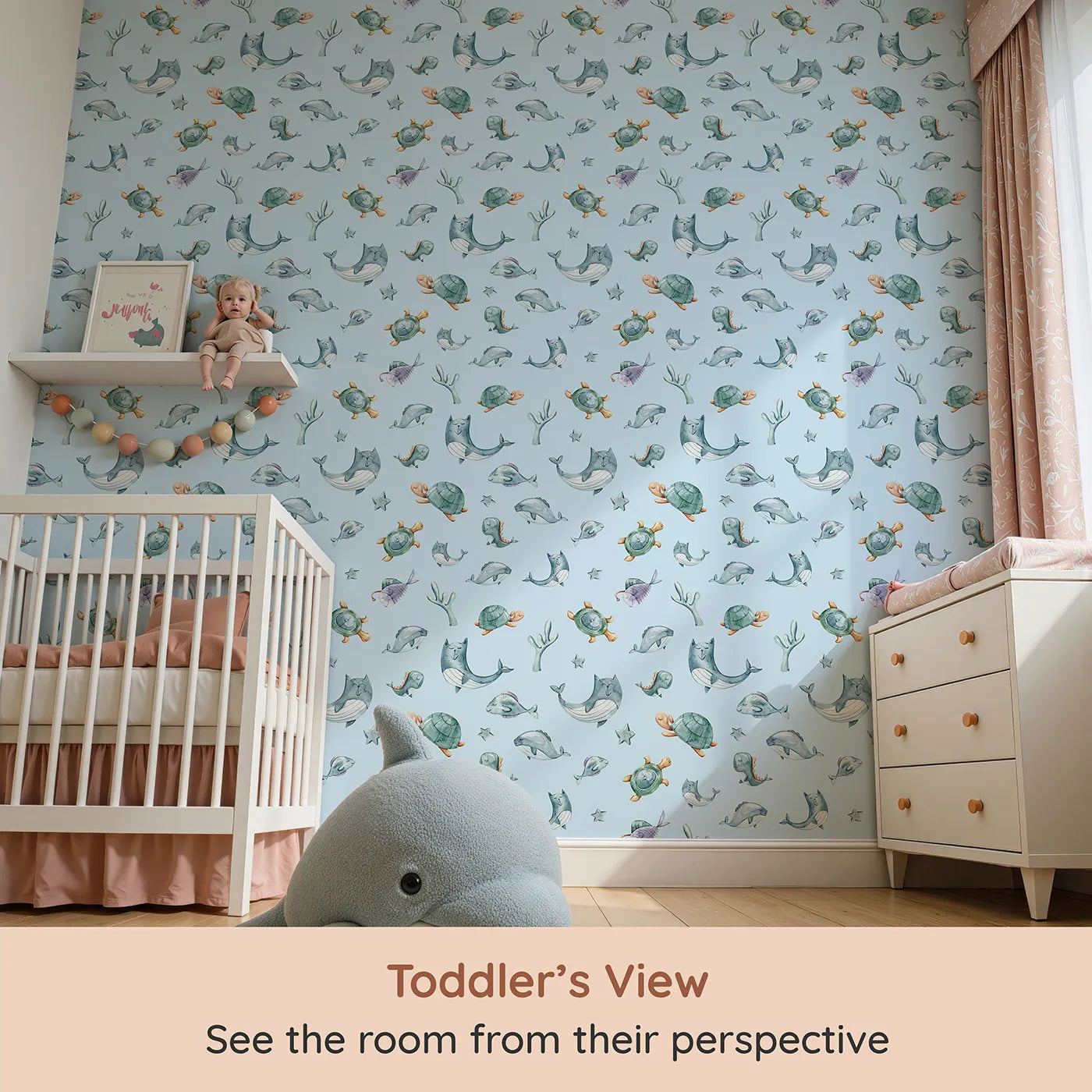 Whimsy Tots Gentle Sea Friends Wallpaper in Sky Blue (W3334E) from your child's view.Ocean animals float across soft sky blue waters in a peaceful scene.