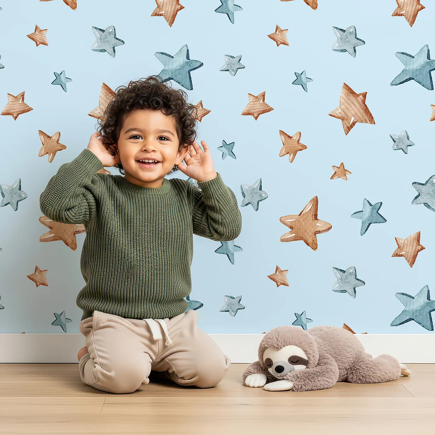 Lovely child standing in front of Whimsy Tots Starry Drift Wallpaper in Blue with star, watercolor, sky, night in design.