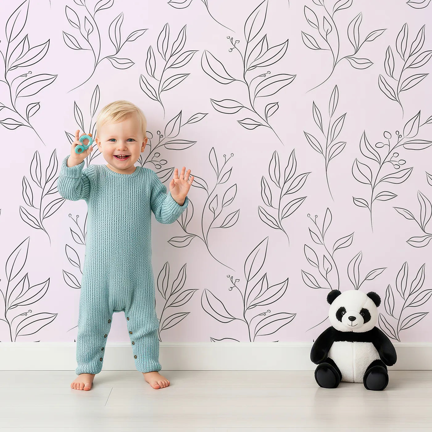 Lovely child standing in front of Whimsy Tots Botanical Sketch Garden in Blush Pink with leaf, berry, branch, sprig in design.
