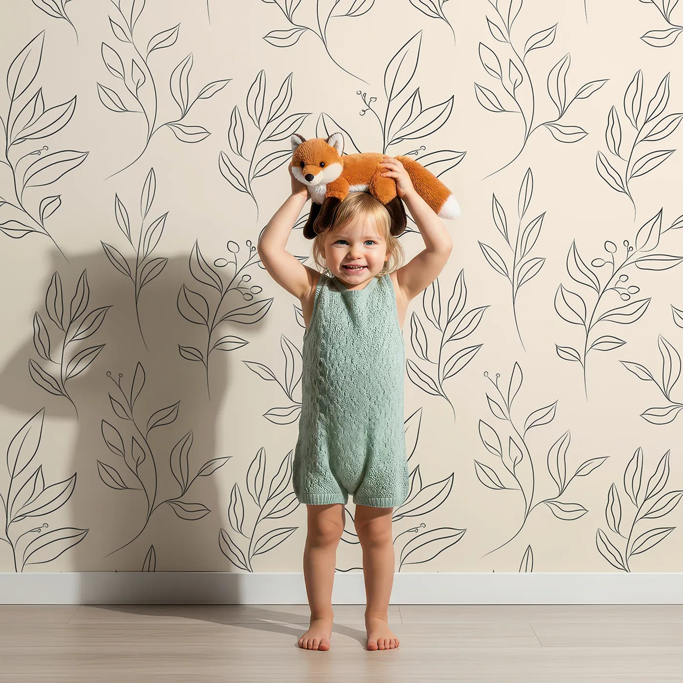 Lovely child standing in front of Whimsy Tots Botanical Sketch Garden in Sand with leaf, berry, branch, sprig in design.