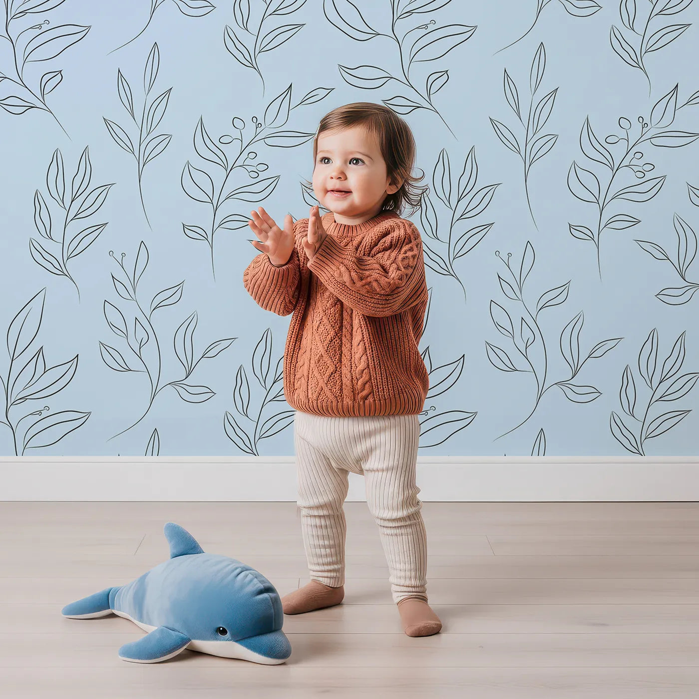 Lovely child standing in front of Whimsy Tots Botanical Sketch Garden in Sky with leaf, berry, branch, sprig in design.