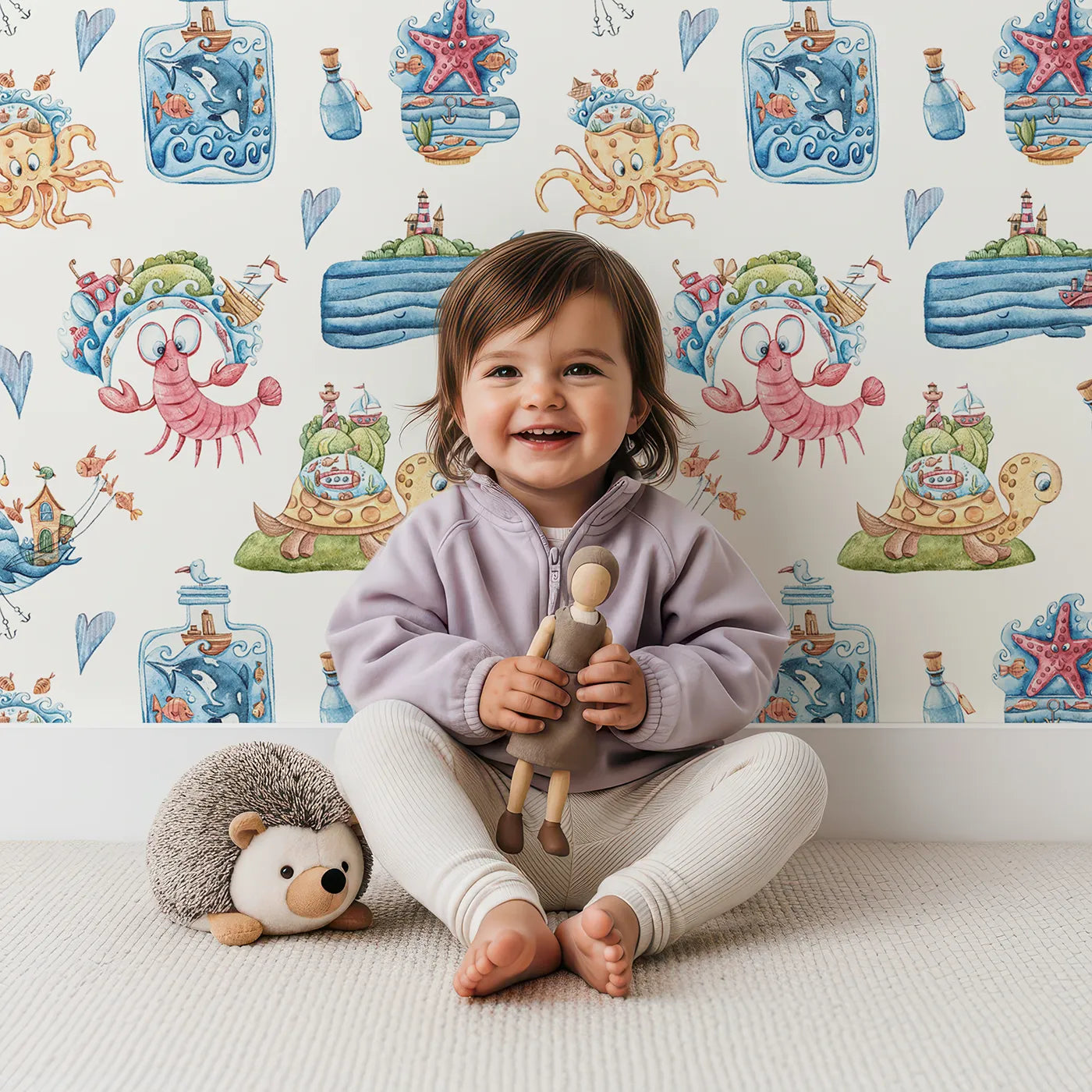 Lovely child standing in front of Whimsy Tots Seaside Story Friends in White with octopus, turtle, whale, dolphin, fish, bottle, island, house, boat in design.