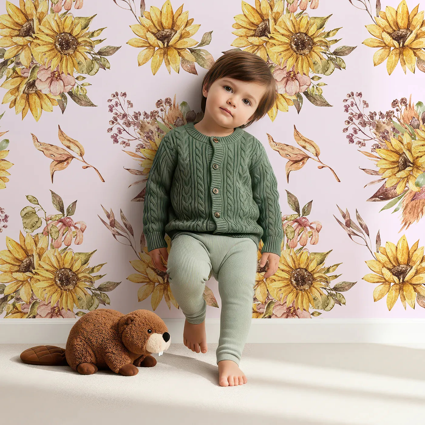Lovely child standing in front of Whimsy Tots Sun-Kissed Meadow Blooms in Blush Pink with sunflower, flower, leaf, bouquet in design.
