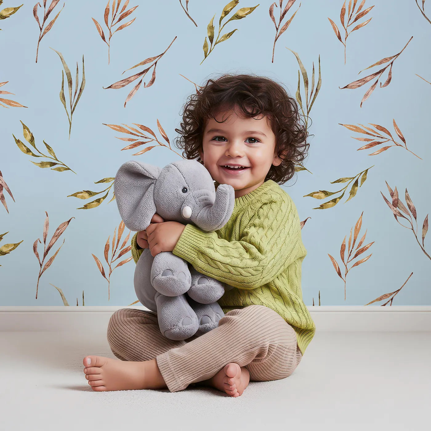 Lovely child standing in front of Whimsy Tots Sunset Meadow Breeze Wallpaper in Sky with leaf, stem, sprig in design.