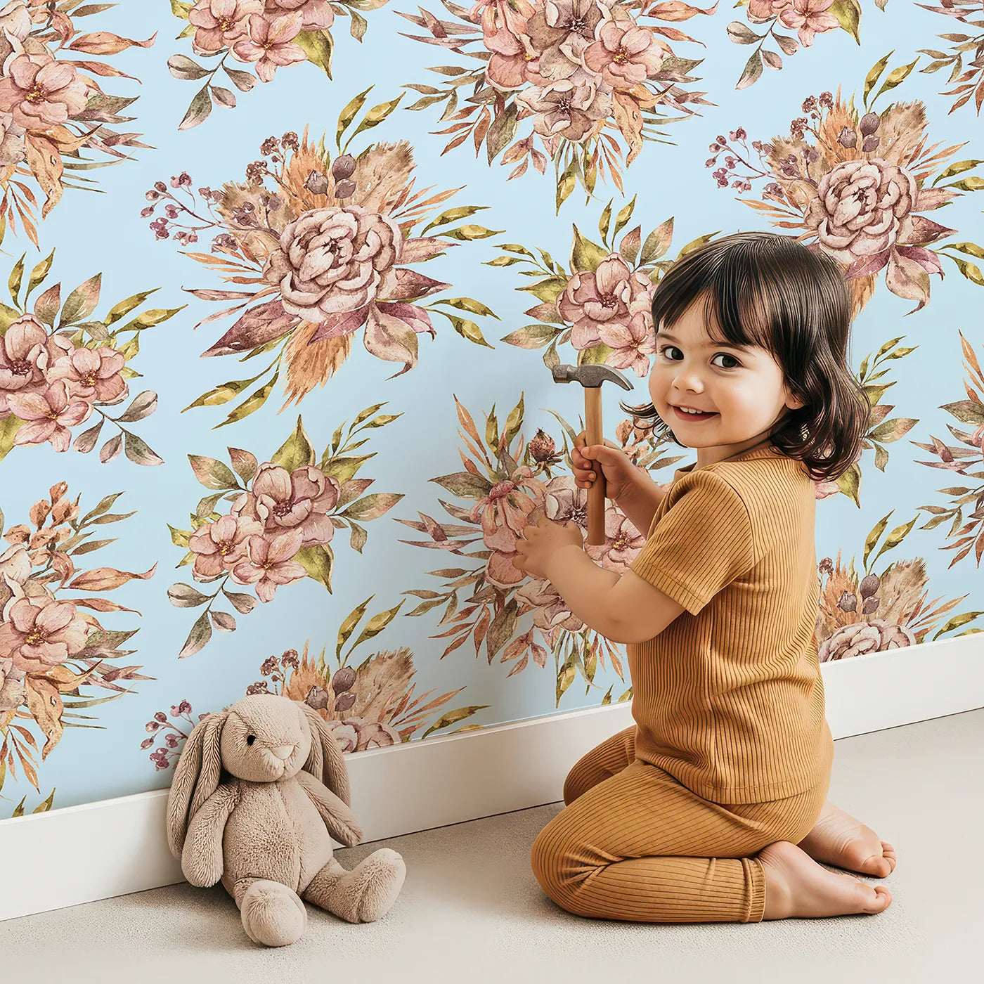Lovely child standing in front of Whimsy Tots Autumn Bloom Harmony Wallpaper in Sky with flower, bouquet, rose, peony in design.