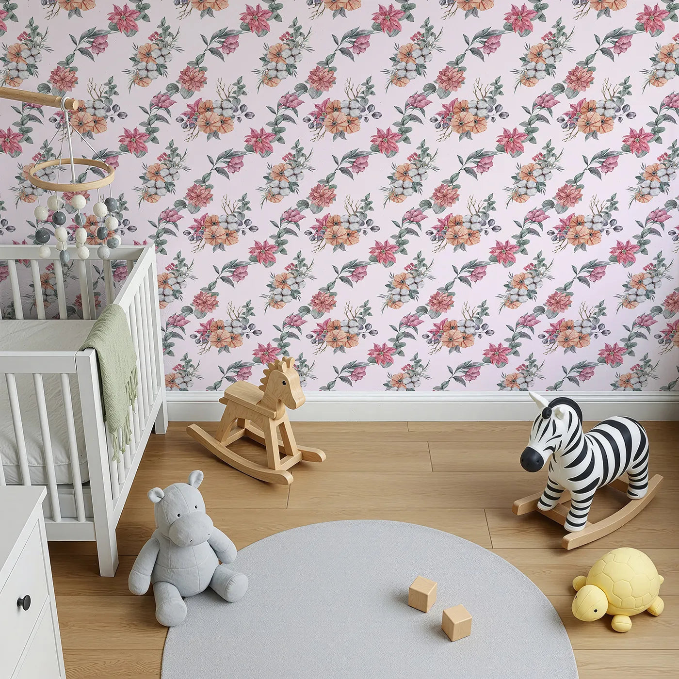 Top-Down view of Whimsy Tots' Winter Blooming Garden Wallpaper in Blush Pink (W3369B).Delicate florals and frosted pods bloom softly on a rosy blush breeze.