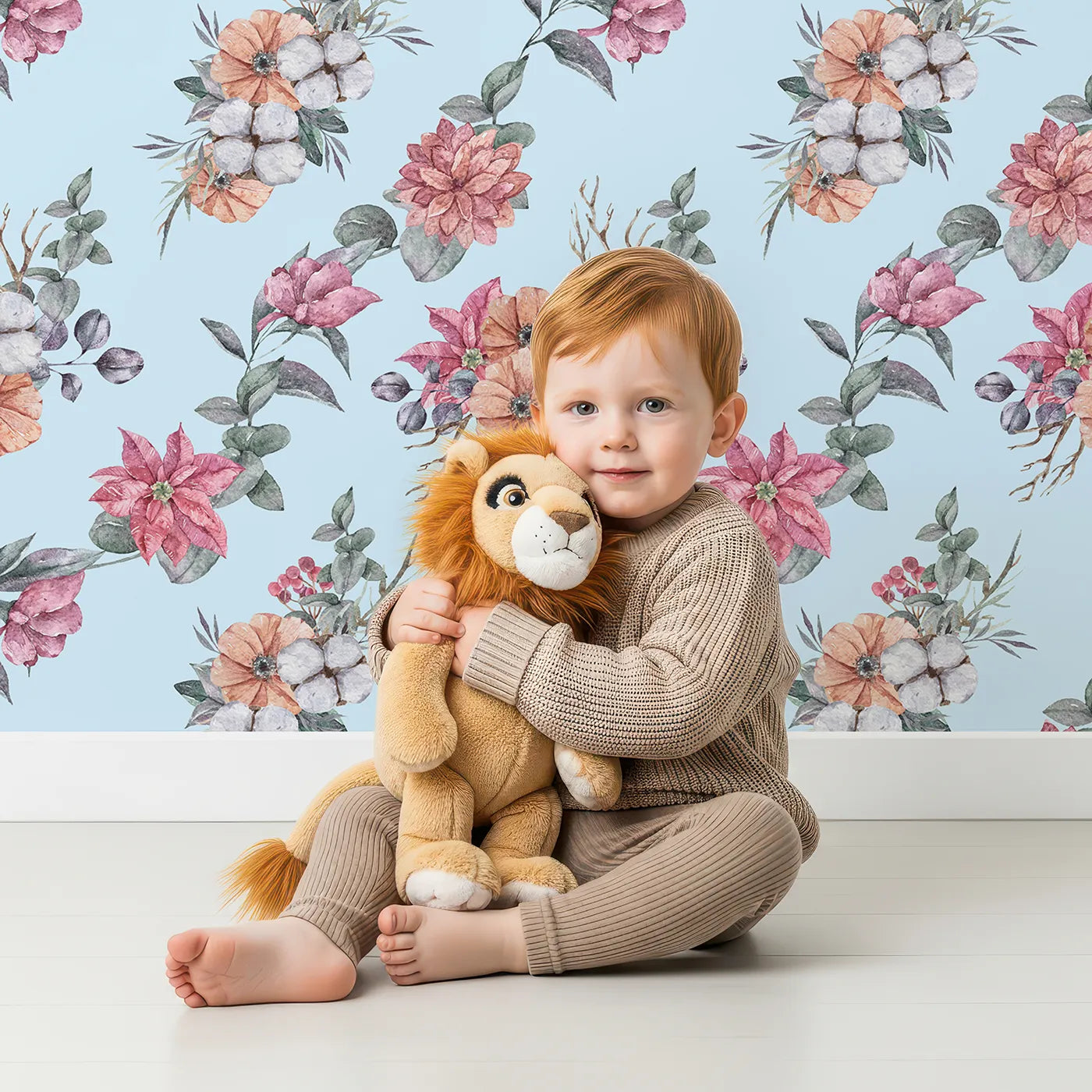 Lovely child standing in front of Whimsy Tots Winter Blooming Garden Wallpaper in Sky with flower, cotton, eucalyptus, poinsettia in design.