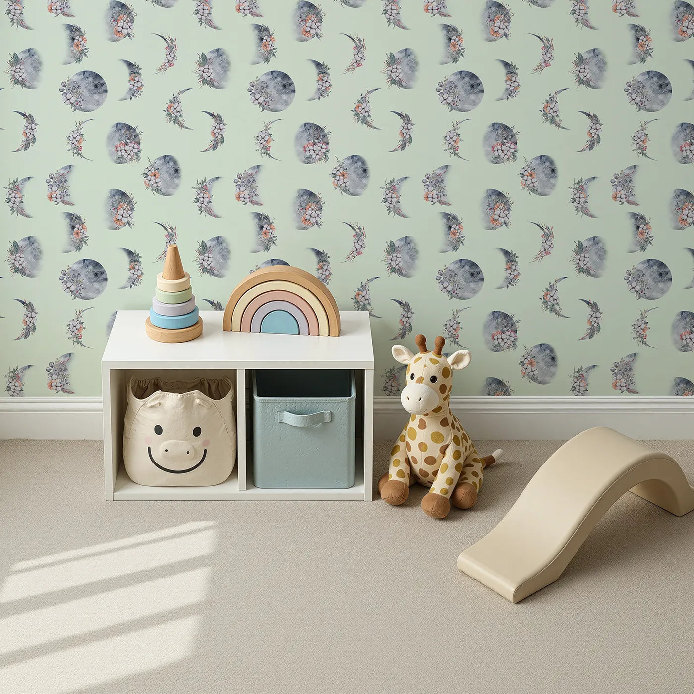 Top-Down view of Whimsy Tots' Celestial Winter Blooms Wallpaper in Mint Green (W3370D).Celestial moons and floral sprigs float across a minty sky.
