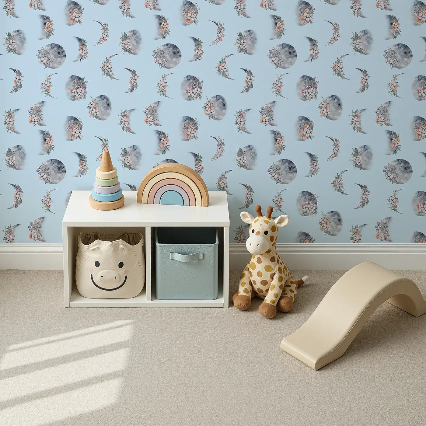 Top-Down view of Whimsy Tots' Celestial Winter Blooms Wallpaper in Sky (W3370E).Moons and winter florals drift softly across a serene sky-blue breeze.