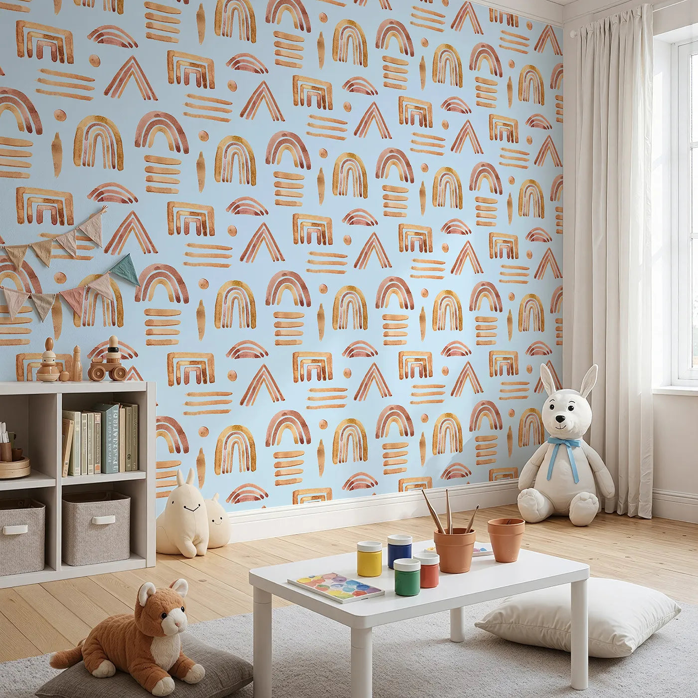 Angled view of Whimsy Tots' Sun-Drenched Shapes Wallpaper in Sky (W3376E).Earthy rainbows float softly on a sky-blue daydream.