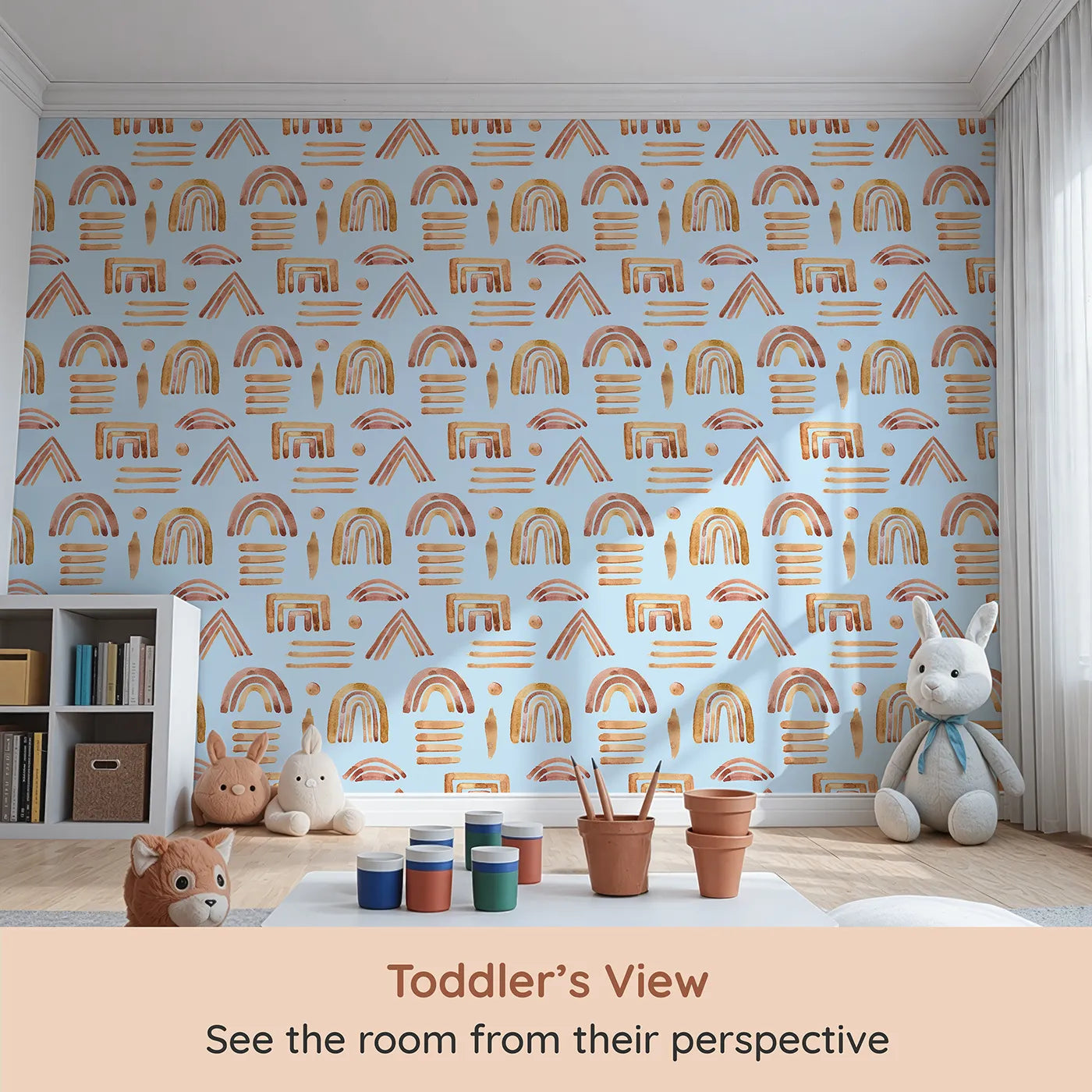 Whimsy Tots Sun-Drenched Shapes Wallpaper in Sky (W3376E) from your child's view.Earthy rainbows float softly on a sky-blue daydream.