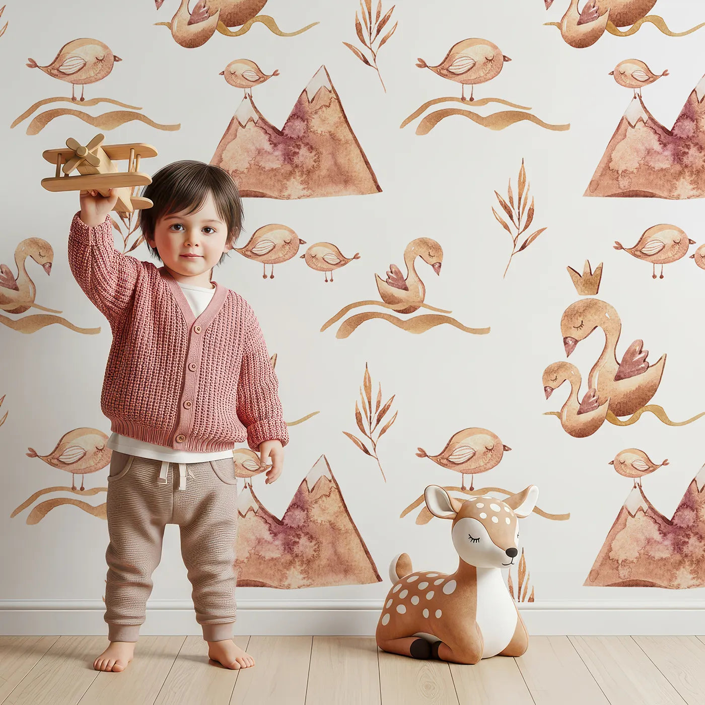 Lovely child standing in front of Whimsy Tots Feathered Serenity Wallpaper in White with bird, swan, crown, mountain, wing in design.