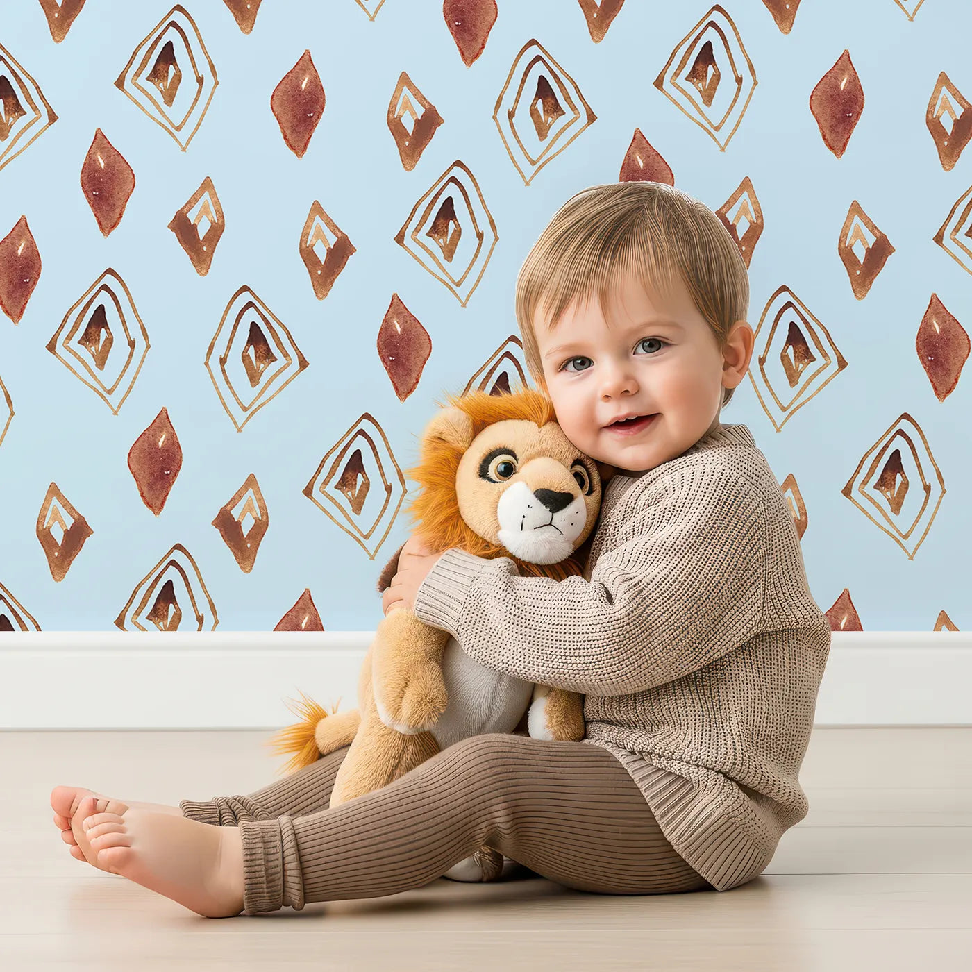 Lovely child standing in front of Whimsy Tots Terracotta Diamond Dance Wallpaper in Sky with diamond, shape, rust, abstract, terracotta in design.