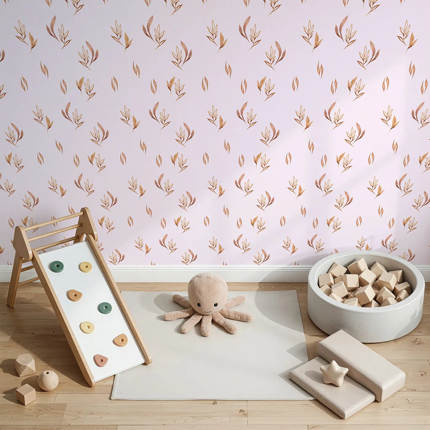 Top-Down view of Whimsy Tots' Rustling Meadow Sprigs Wallpaper in Blush Pink (W3382B).Watercolor leaves and sprigs flutter across a soft blush sky.
