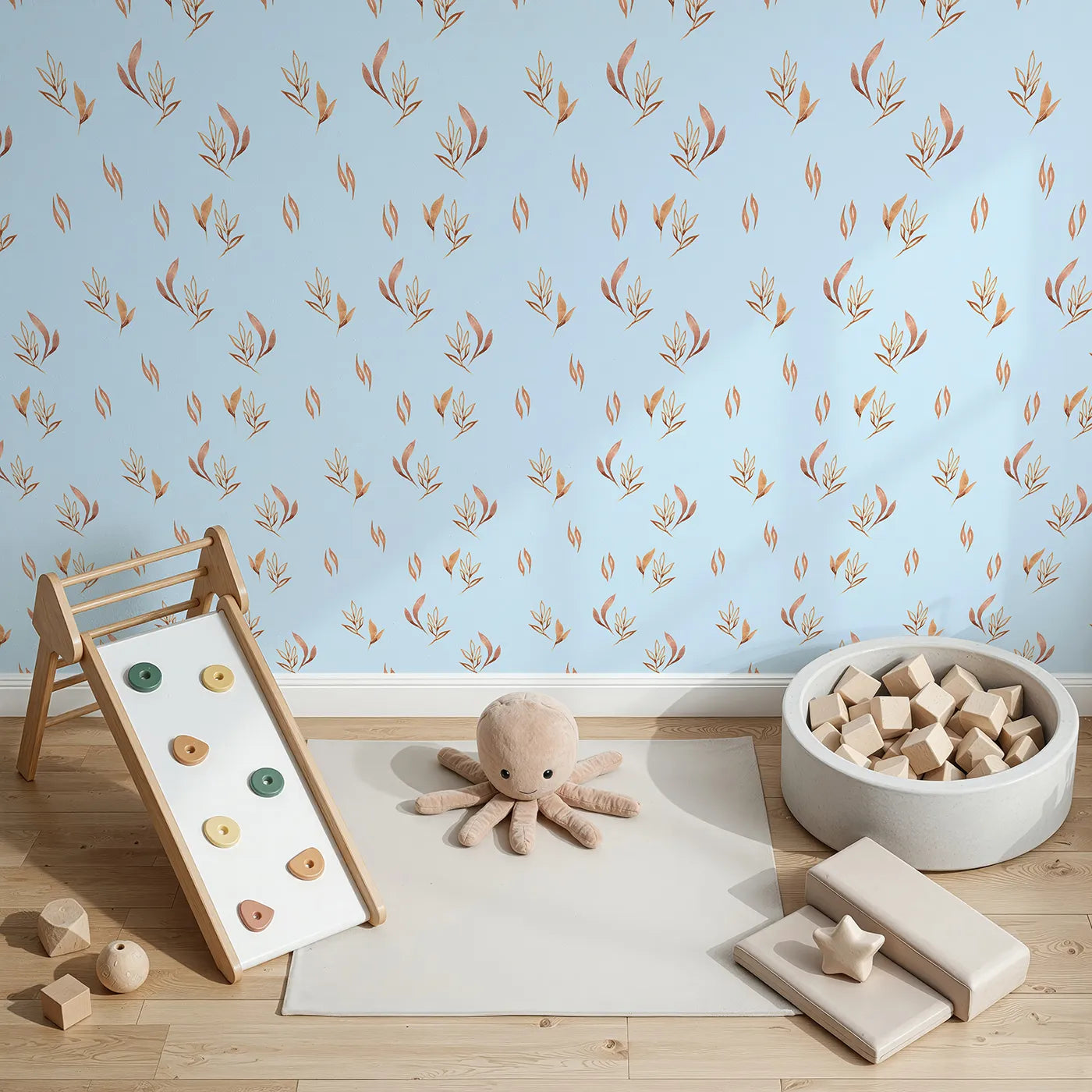 Top-Down view of Whimsy Tots' Rustling Meadow Sprigs Wallpaper in Sky (W3382E).Watercolor leaves and sprigs flutter across a breezy sky-blue canvas.