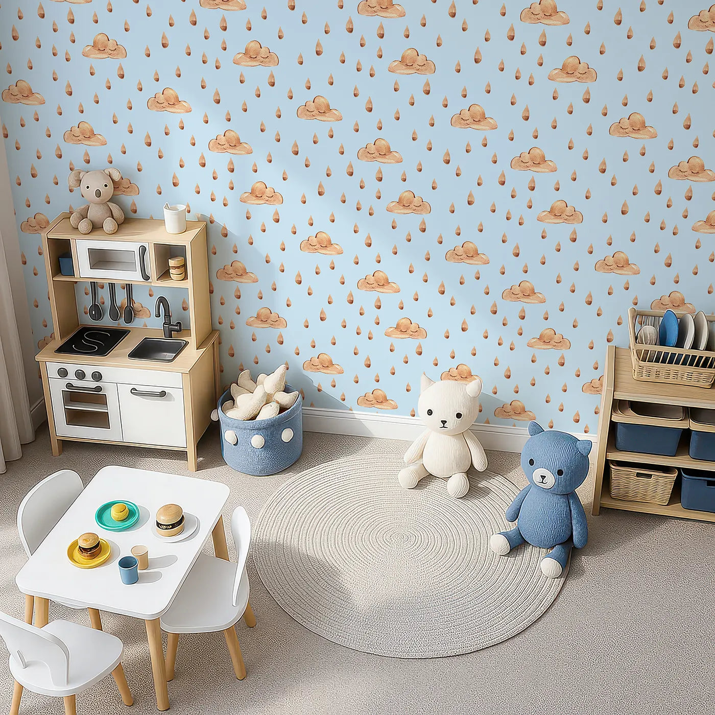 Top-Down view of Whimsy Tots' Rainy Day Nap Wallpaper in Blue (W3384E).Watercolor clouds and sleepy raindrops drift softly on a soft blue sky.