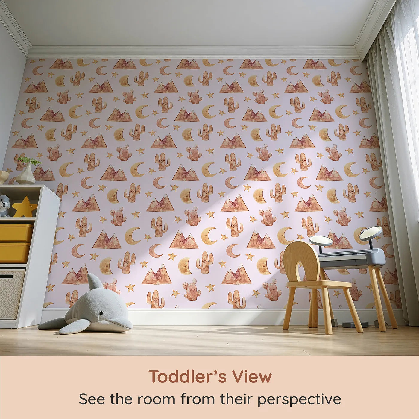Whimsy Tots Desert Moon Dreams Wallpaper in Blush Pink (W3385B) from your child's view.Mountains, moons, and sleepy cacti drift gently across a blush-toned sky.