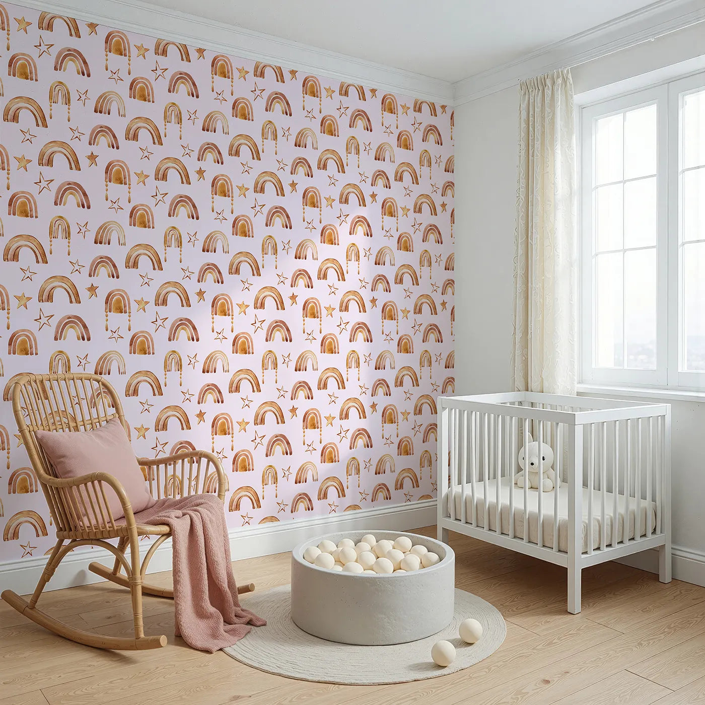 Angled view of Whimsy Tots' Golden Boho Rainbows Wallpaper in Blush (W3387B).Warm-toned arches and golden stars shimmer on a gentle blush sky.
