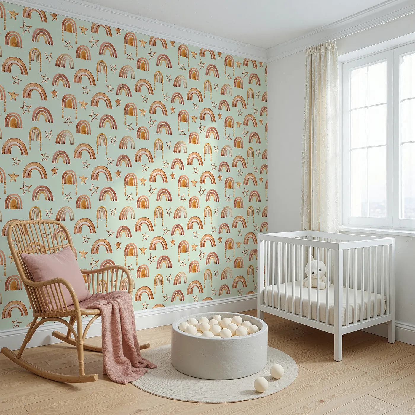 Angled view of Whimsy Tots' Golden Boho Rainbows Wallpaper in Mint (W3387D).Rustic arches and soft stars float across a gentle mint sky.