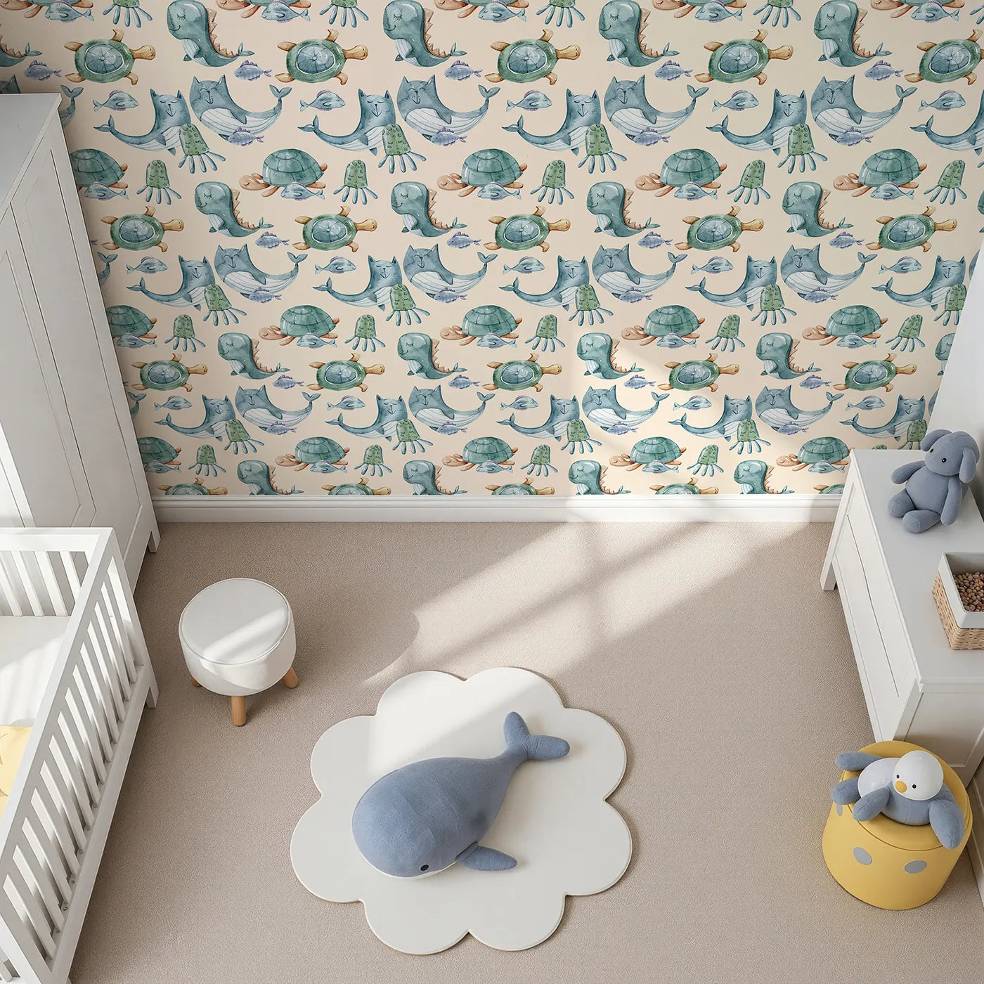 Top-Down view of Whimsy Tots' Ocean Pals Parade Wallpaper in Sand (W3392C).A sea of sleepy smiles floats across a soft sandy backdrop.