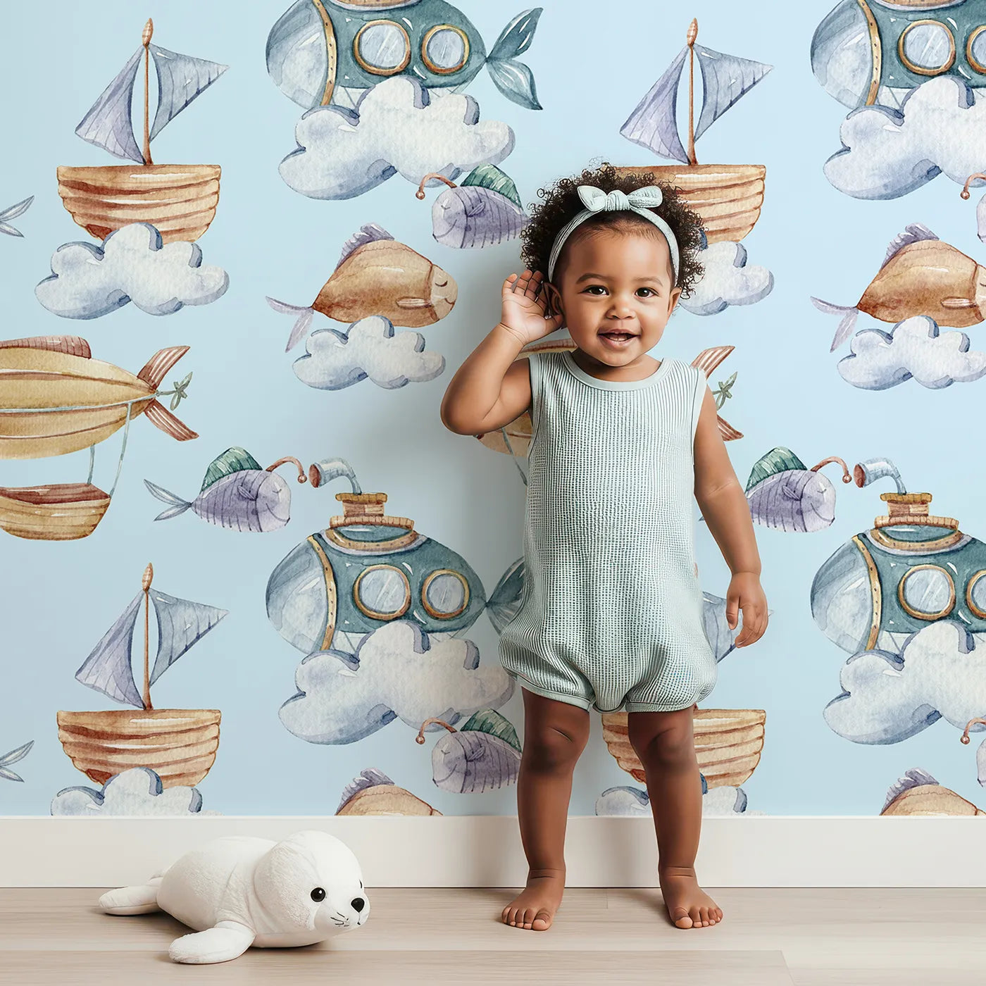 Lovely child standing in front of Whimsy Tots Skybound Explorers Wallpaper in Sky with submarine, boat, fish, cloud, airship in design.