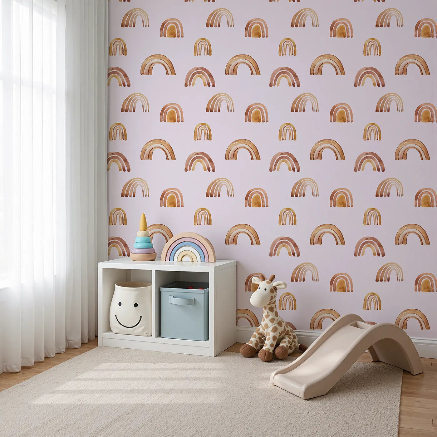 Angled view of Whimsy Tots' Boho Brush Rainbow Wallpaper in Pink (W3398B).Earthy rainbows float across a rosy pink sky.