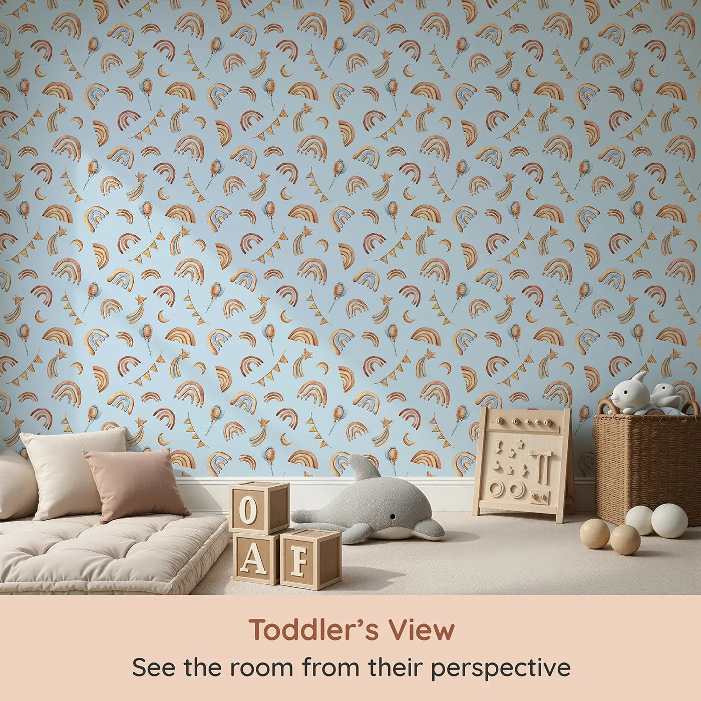 Whimsy Tots Sky Bloom Party Wallpaper in Blue (W3402E) from your child's view.Cheerful rainbows and soft balloons float across a sky-blue canvas.