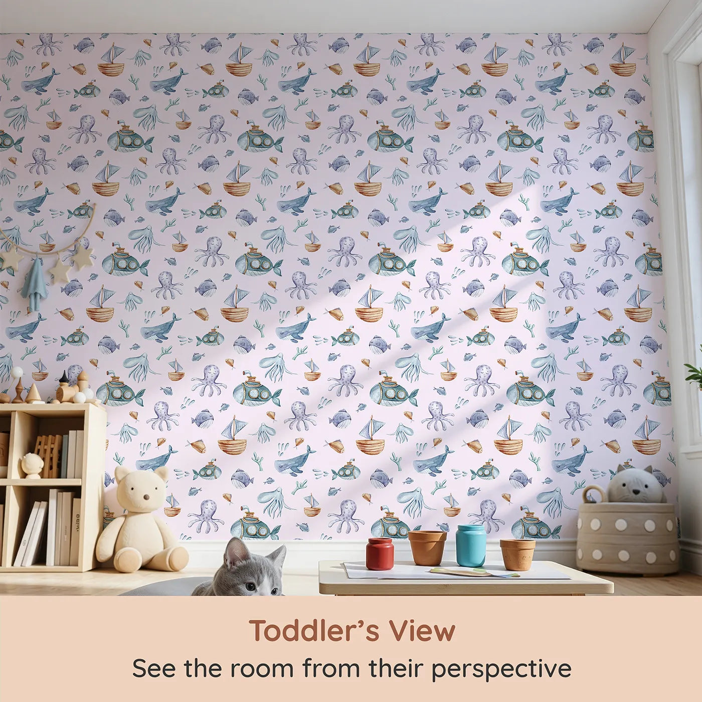 Whimsy Tots Deep Sea Discovery Wallpaper in Pink (W3403B) from your child's view.Gentle ocean friends and curious subs float through a pastel pink sea.