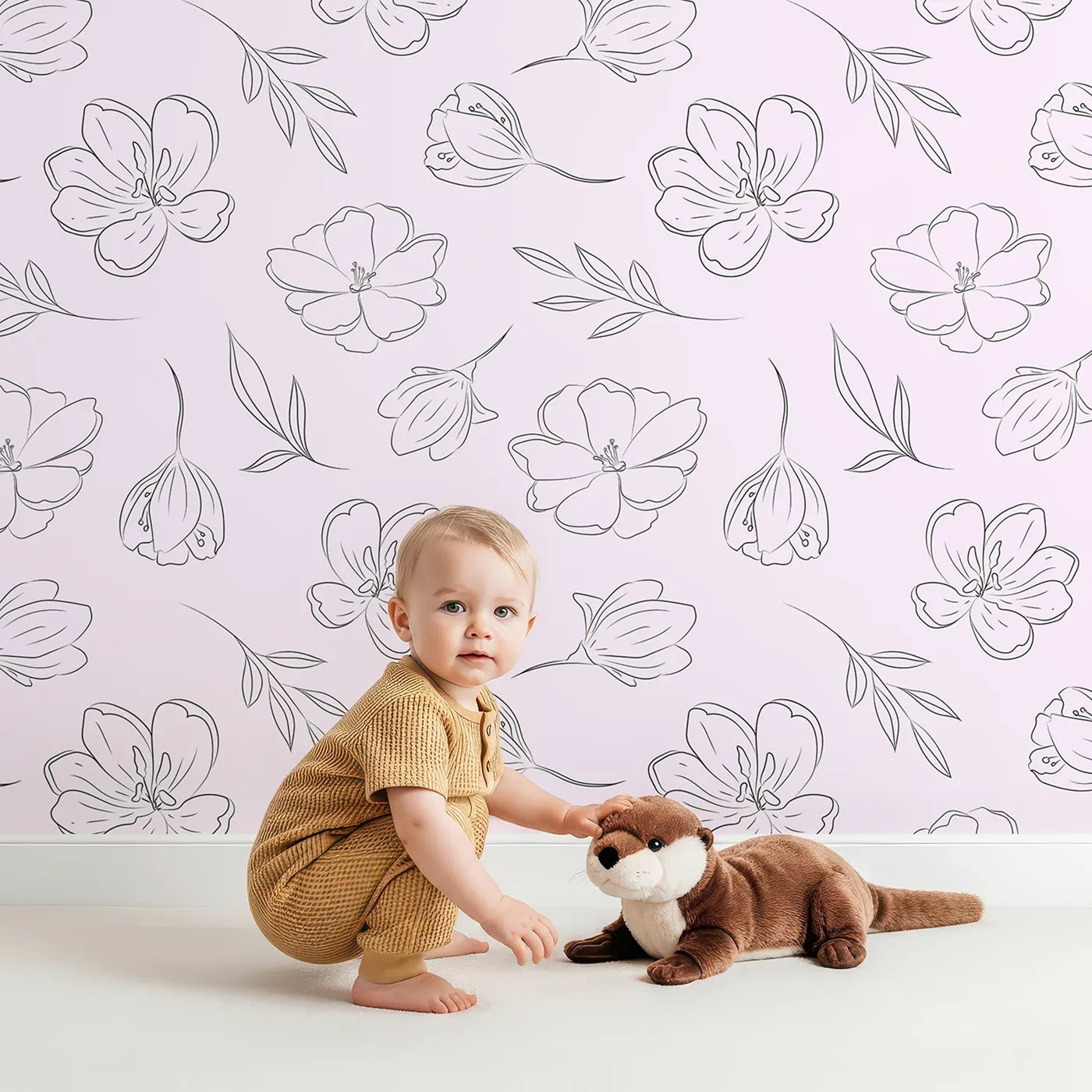Lovely child standing in front of Whimsy Tots Petal Outline Bloom Wallpaper in Blush Pink with flower, petal, bell flower, sprig, leaf, botanical in design.