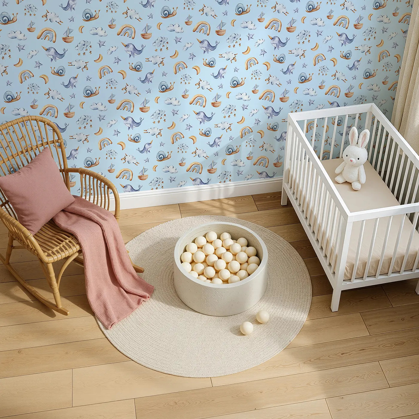 Top-Down view of Whimsy Tots' Dreamscape Journey Wallpaper in Blue (W3415E).Narwhals, moons, and clouds float gently across a soft blue sky.