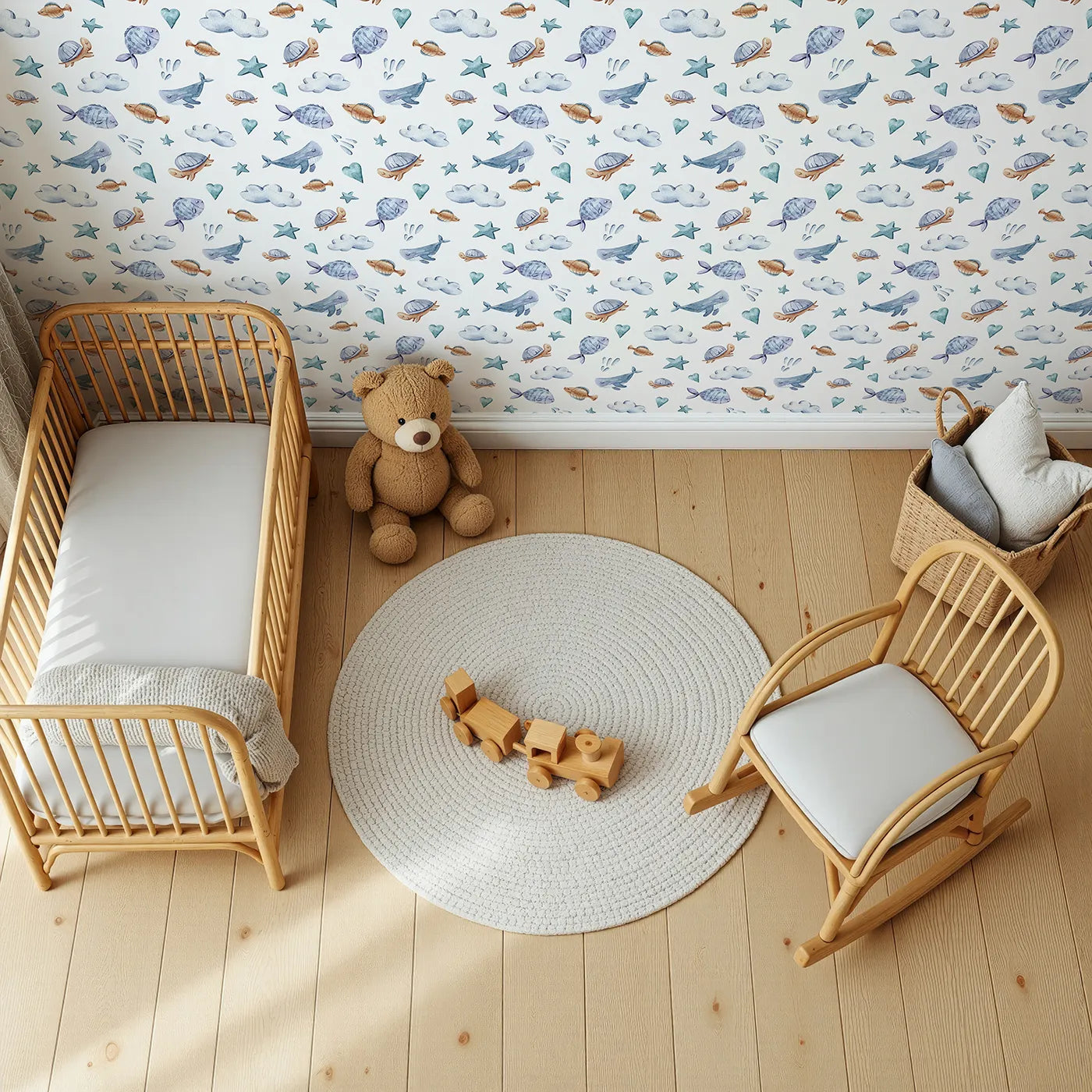 Top-Down view of Whimsy Tots' Sleepy Sea Sky Wallpaper in White (W3417A).Turtles, whales, and clouds float peacefully across a soft white sky.