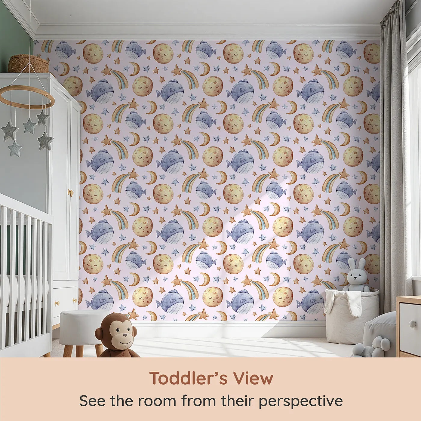 Whimsy Tots Sleepy Celestial Whale Wallpaper in Blush Pink (W3421B) from your child's view.Starry dreams and blushing moons float gently in a pink-tinted sea.