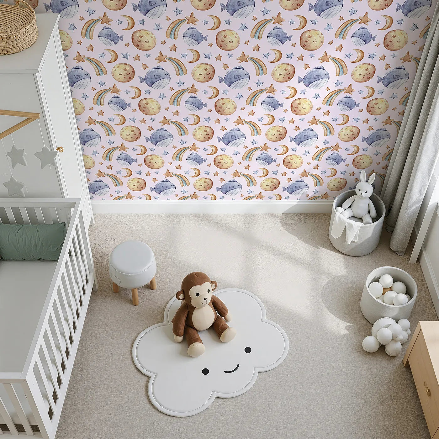 Top-Down view of Whimsy Tots' Sleepy Celestial Whale Wallpaper in Blush Pink (W3421B).Starry dreams and blushing moons float gently in a pink-tinted sea.