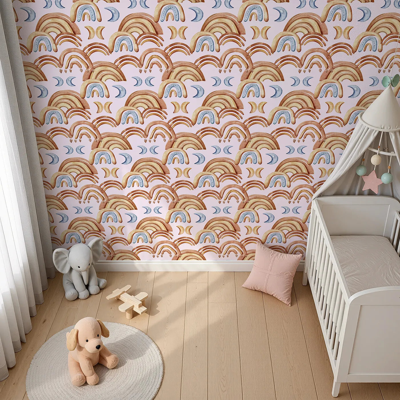 Top-Down view of Whimsy Tots' Boho Rainbow Night Wallpaper in Blush Pink (W3423B).Terracotta rainbows and soft moons float across a pastel pink sky.