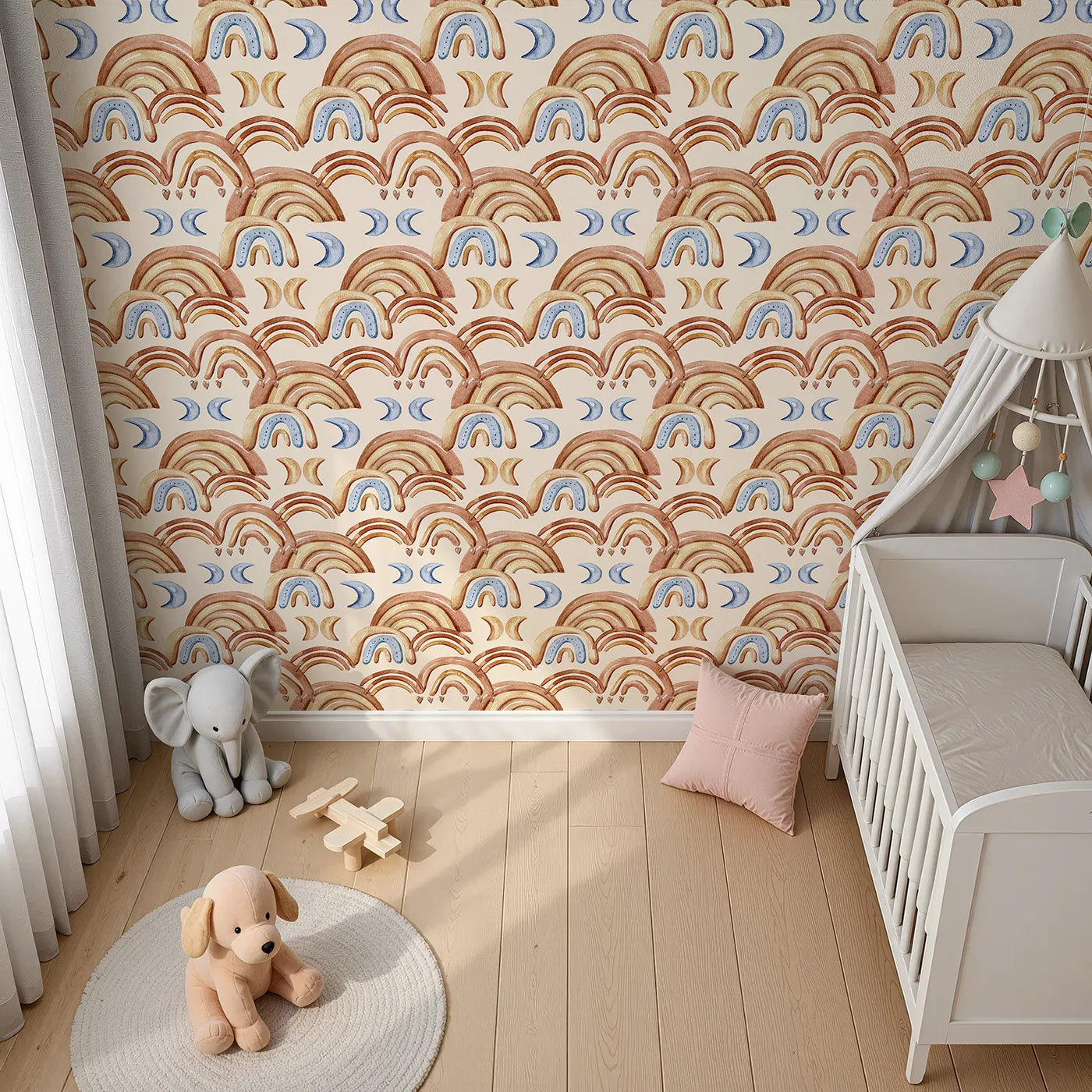 Top-Down view of Whimsy Tots' Boho Rainbow Night Wallpaper in Sand (W3423C).Warm earth-toned rainbows and crescent moons drift across a soft sand sky.