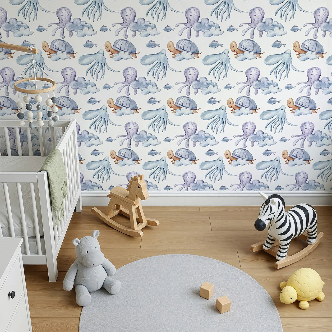 Top-Down view of Whimsy Tots' Ocean Cloud Cuddle Wallpaper in White (W3425A).Sleepy turtles and octopuses nestle on watercolor clouds.