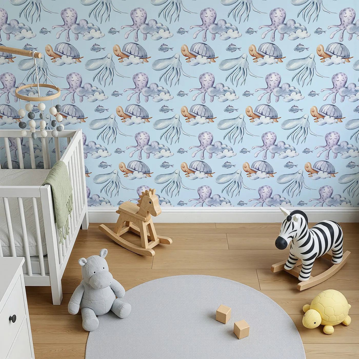 Top-Down view of Whimsy Tots' Ocean Cloud Cuddle Wallpaper in Sky Blue (W3425E).Sleepy turtles and octopuses nestle on watercolor clouds.