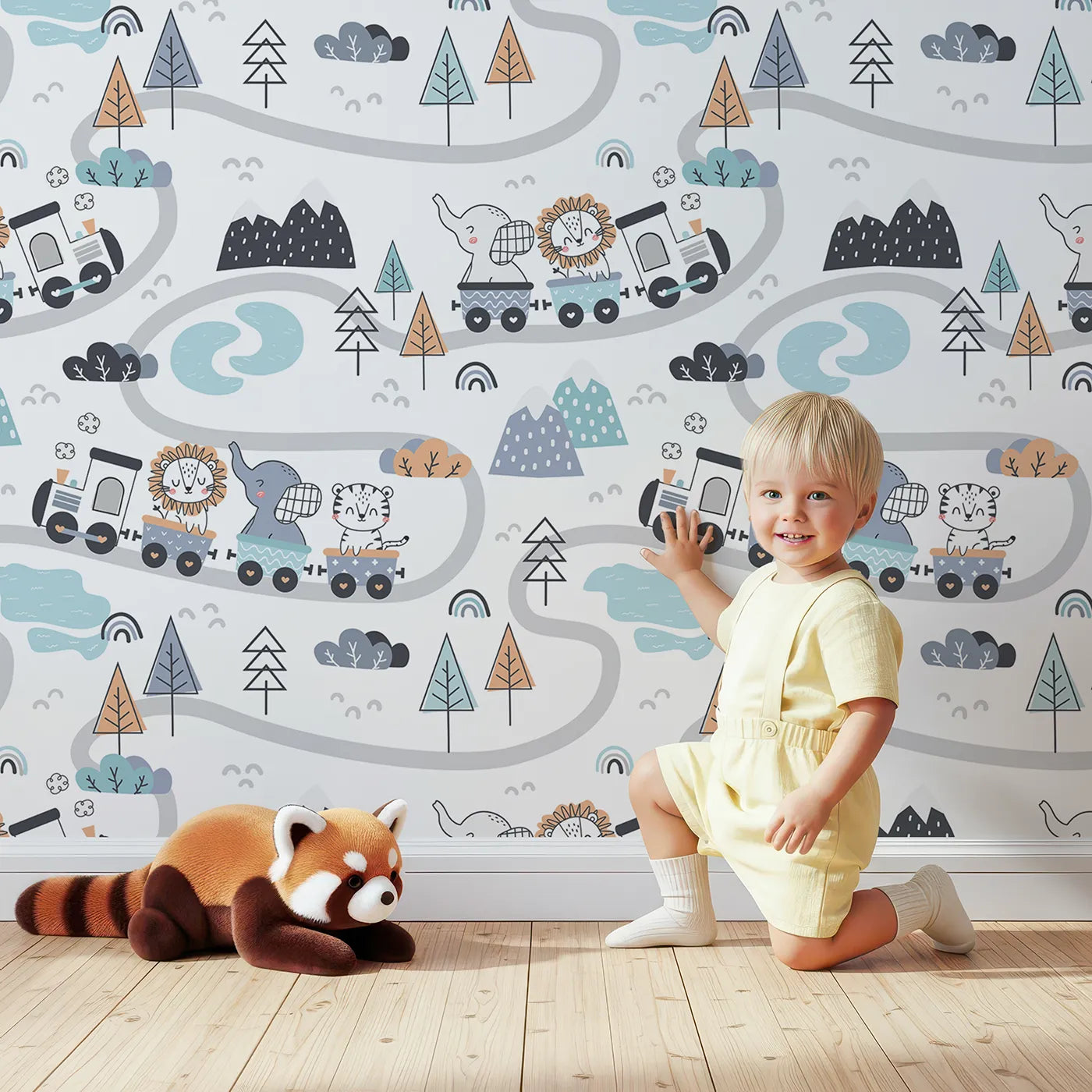 Lovely child standing in front of Whimsy Tots Animal Train Adventure Wallpaper in White with train, lion, elephant, tiger, rainbow, tree, mountain in design.