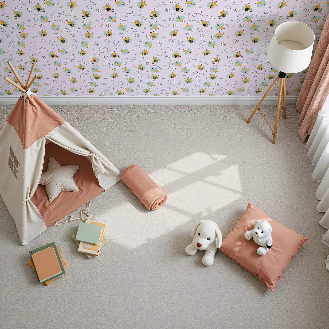 Top-Down view of Whimsy Tots' Busy Bees at Play Wallpaper in Blush Pink (W3434B).Happy bees twirl across a soft pink sky, full of flowers and joy.