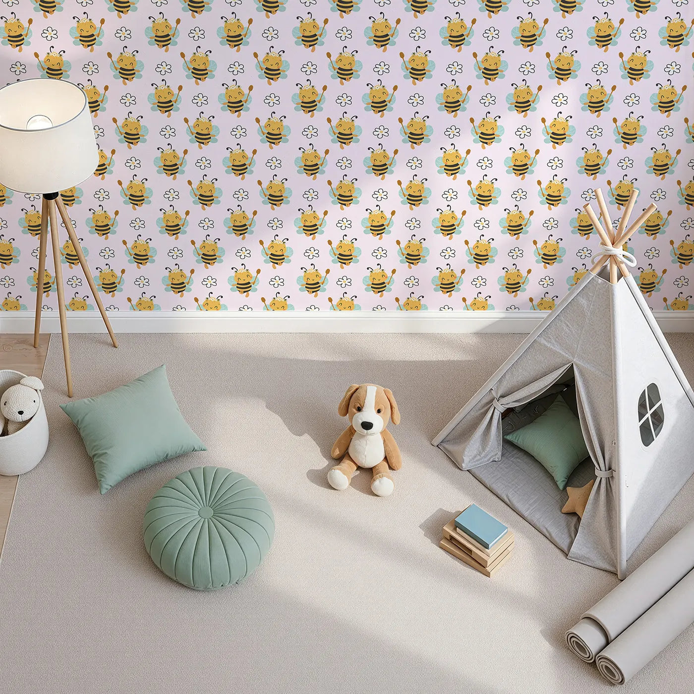 Top-Down view of Whimsy Tots' Bee Blossom Parade Wallpaper in Blush Pink (W3435B).Crowned bees and happy flowers float across a soft pink sky.