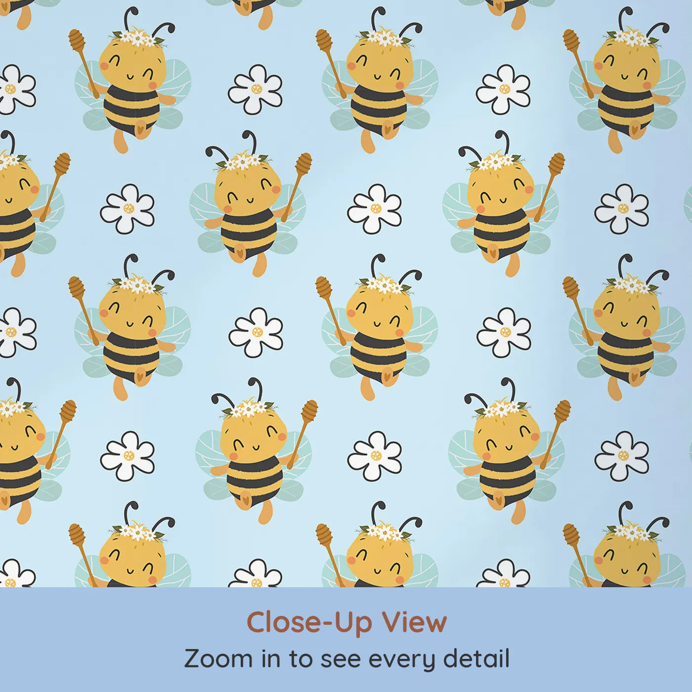Close-up view of Whimsy Tots' Bee Blossom Parade Wallpaper in Sky (W3435E).Daisy-crowned bees float sweetly through a soft blue sky of joy.