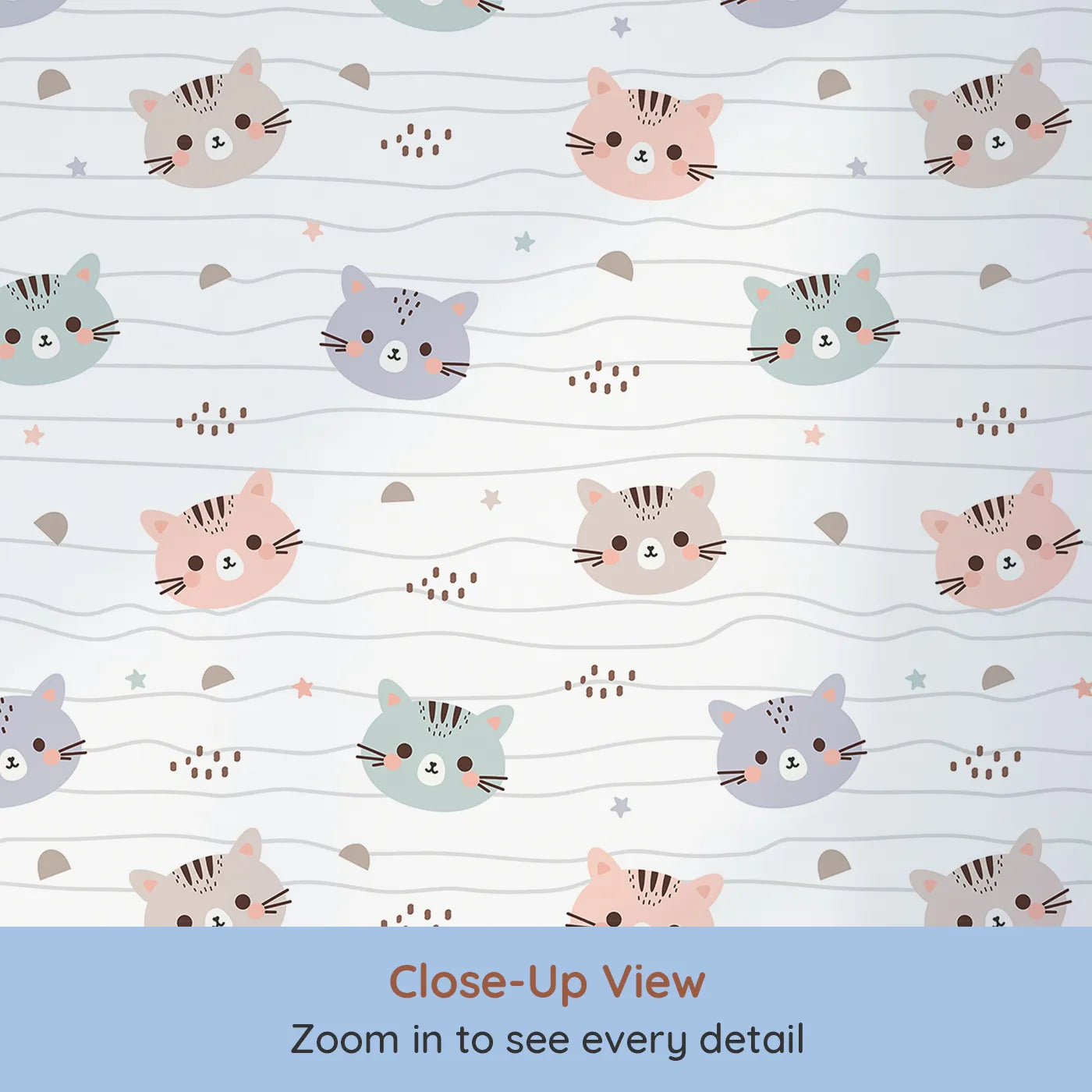 Close-up view of Whimsy Tots' Whisker Wiggle Cats Wallpaper in White (W3439).Sweet kitty faces peek out across soft wavy lines and stars.
