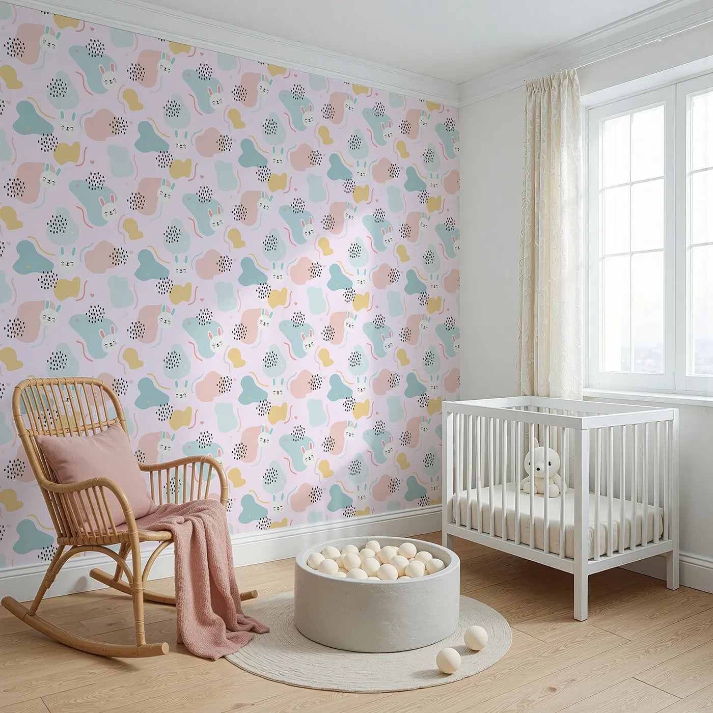 Angled view of Whimsy Tots' Bunny Bounce Abstract Wallpaper in Blush Pink (W3443A).Smiling rabbits and playful shapes hop across a dreamy pink sky.
