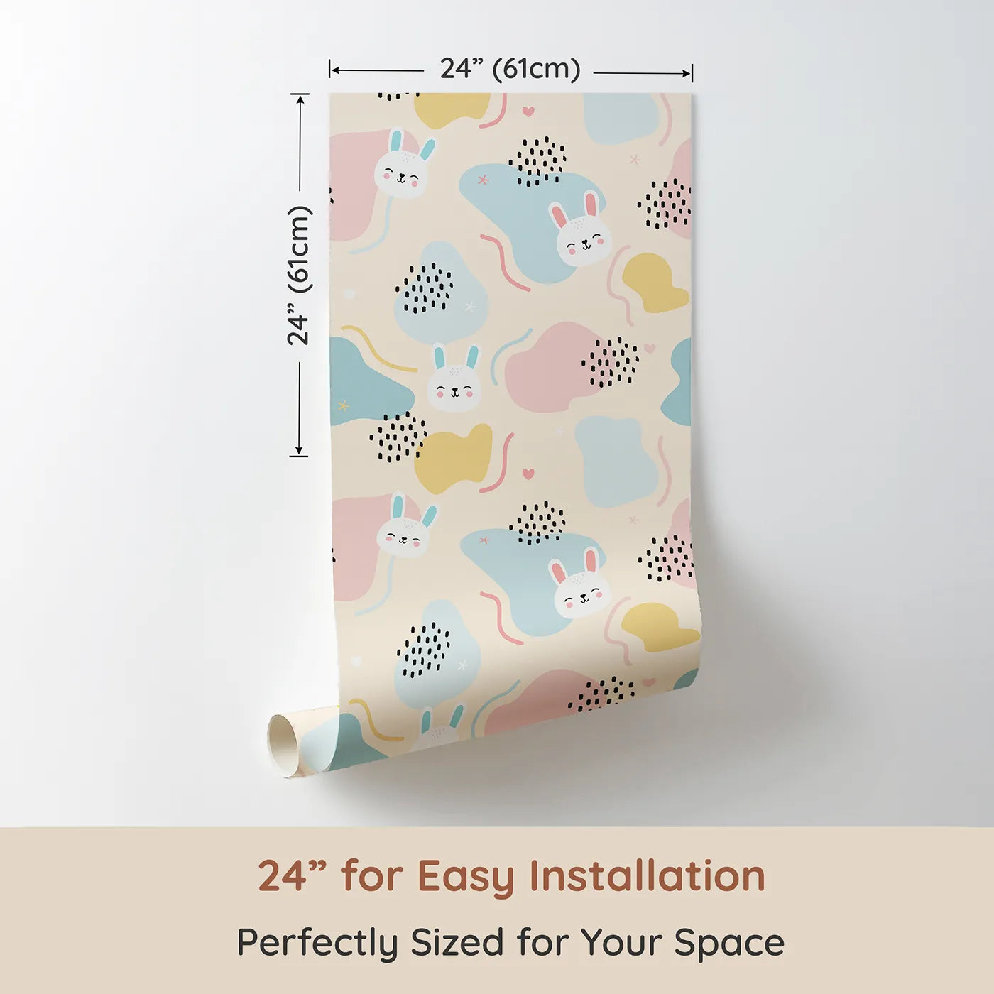 Dimension view of Whimsy Tots Bunny Bounce Abstract Wallpaper in Buttercream (W3443B). Printed in 24-inch-wide panel for easy installation. Smiling rabbits and playful shapes hop across a soft buttercream sky.