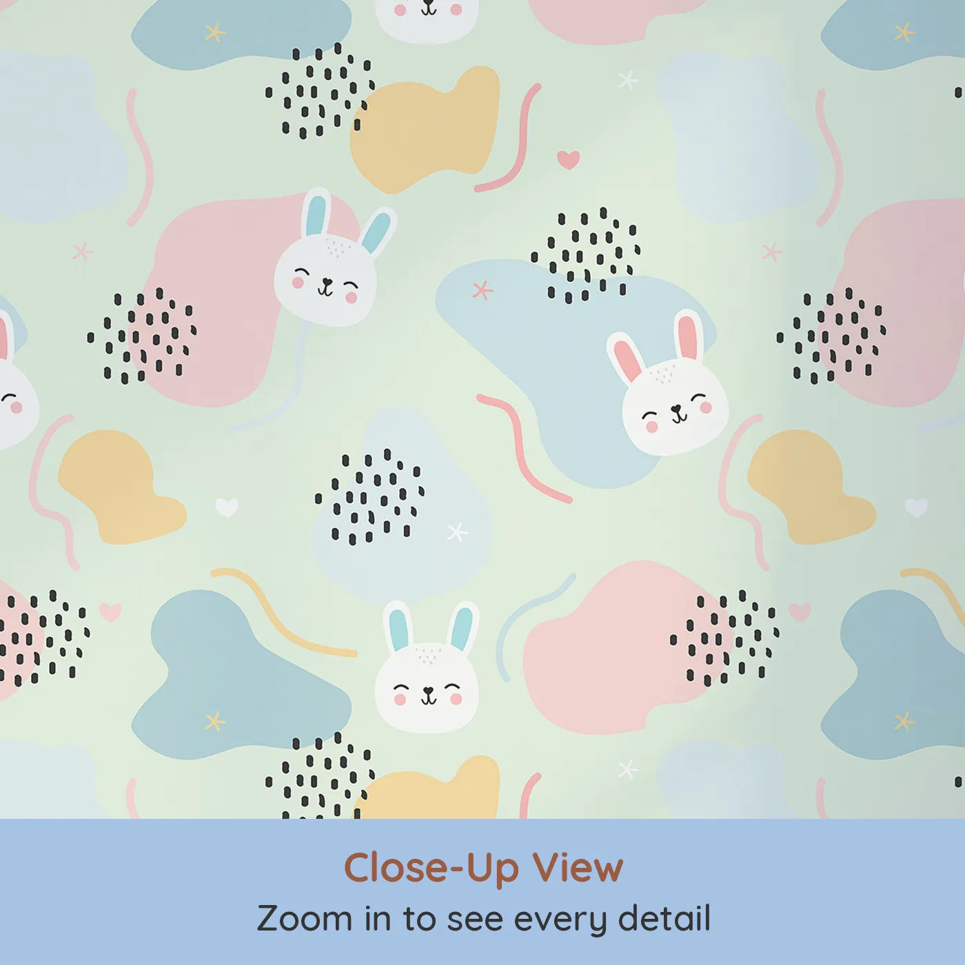 Close-up view of Whimsy Tots' Bunny Bounce Abstract Wallpaper in Mint Green (W3443C).Smiling rabbits and playful shapes hop across a breezy mint sky.
